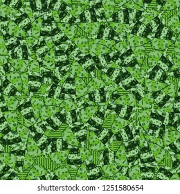 Seamless pattern. Speckled green leaves are randomly arranged against wavy lines. Camouflage style.