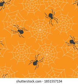 Seamless pattern with spiders on the web. Halloween print.
