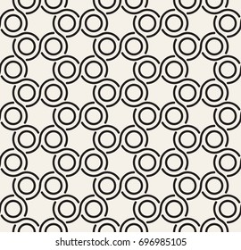 Seamless pattern with spiral curls. Vector repeating texture. Stylish background with twisted elements and linear rings.