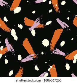 Seamless pattern. Spots. Brush texture. Black background.