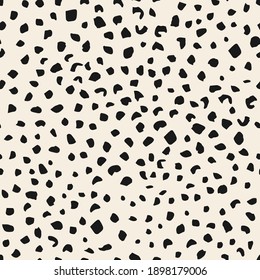 Seamless pattern with spots. Creative texture for fabric, wrapping, textile, wallpaper, apparel. Vector illustration background in milk and black.