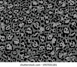 Seamless pattern of spots in the style of the skin of a leopard. Dark spots on a gray background. Vector
