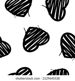 Seamless pattern of sprayed heart symbol. Vector illustration with overspray in black over white