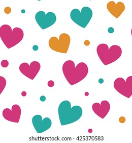 Seamless pattern with spring colored hearts and dots on a white background. Simple vector repeating texture.