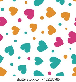 Seamless pattern with spring colored hearts and dots on a white background. Vector repeating texture. Perfect for printing on fabric or paper.