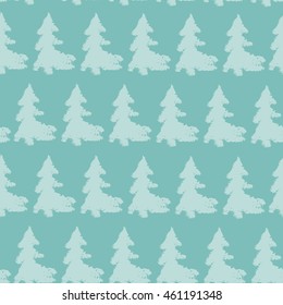 Seamless pattern with spruces on green background