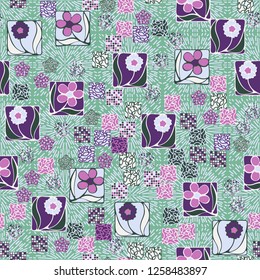 Seamless pattern. Squares containing flowers surrounded by a placer of abstract elements are located on the background of radiant elements.
