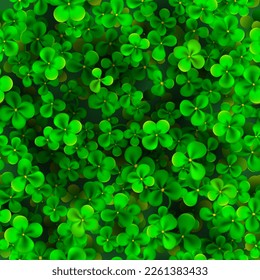 Seamless pattern for St. Patrick's Day made of realistic clover leaves in green colors