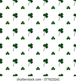 Seamless pattern for St. Patrick's Day with shamrock and clover on white background. Vector illustration.