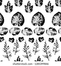 Seamless pattern with stamp  leaf on white background. Endless texture for nature design. Autumn print. Imprint of leaves. Textile design. Vector illustration