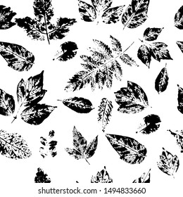 Seamless pattern with stamp leaves. Objects isolated on white background. Black and white.