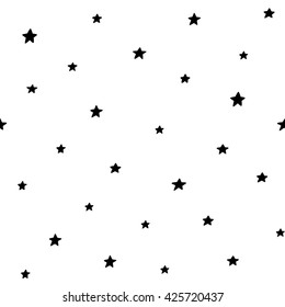 Seamless pattern with stars. Hand drawn vector illustration.