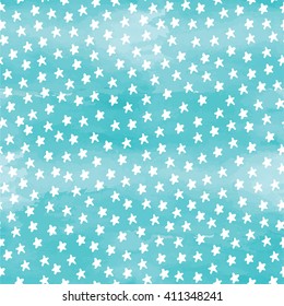 Seamless pattern with stars on blue watercolor background.