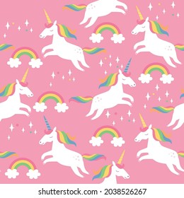 Seamless pattern with stars, rainbows and unicorns. Vector illustration. 