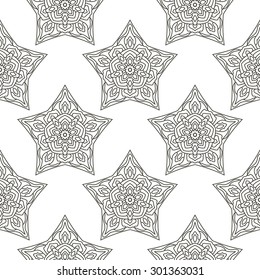 Seamless pattern of stars with tribal print. Design texture for Wallpaper, wrapper, fabric.