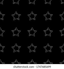 Seamless pattern with stars. White outline drawing of stars on a black background. Vector image. Design for wrapping paper, textiles, scrap paper. New year, Christmas, space.