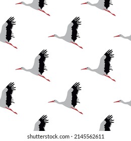 Seamless pattern with storks on a white background. The wild nature. Vector illustration.