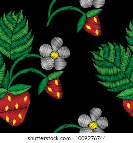 Seamless pattern with strawberry and flower embroidery stitches imitation. Fashion strawberry embroidery on black background. Embroidery style strawberry.