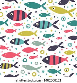 Seamless pattern with striped fishes.