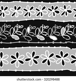 Seamless   pattern of  striped motif,   branches, leaves, ellipses, flowers,stripes, doodles. Hand drawn.
