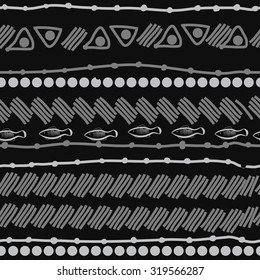 Seamless   pattern of striped motif, ellipses, stripes, fishes, doodles. Hand drawn.