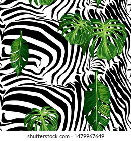 Seamless pattern of stripes of zebra, tiger and exotic leaves.