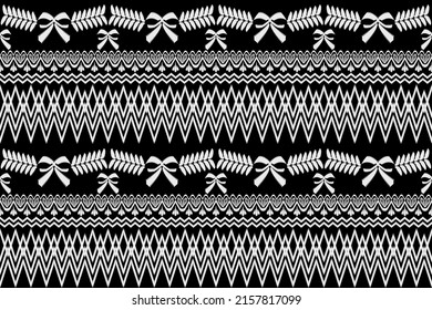 Seamless pattern in the style of folk tribal traditional leaf foliage pattern with decorative ribbon and embroidery zigzag print with a vintage design. Vector.