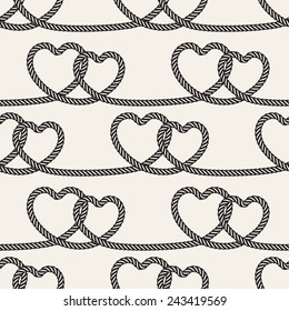 Seamless pattern. Stylish background. Monochrome texture with ropes and knots. Vector repeating tangled rope