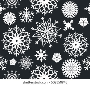 Seamless pattern with stylish snowflakes isolated on blue background. Elegant background can be used for linen, paper, bedclothes, textile, cover, card and more creative designs.