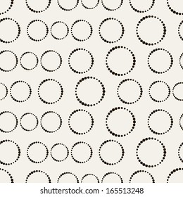 Seamless pattern. Stylish texture with dotted circles. Vector repeating background