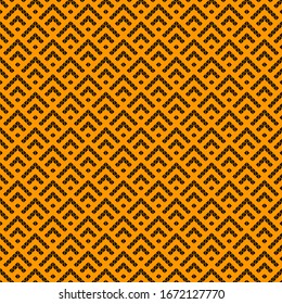Seamless pattern. Stylized chevrons, triangles ornament. Triangular shapes backdrop. Folk wallpaper. Figures background. Tribal motif. Ancient mosaic. Digital paper, textile print, web design. Vector