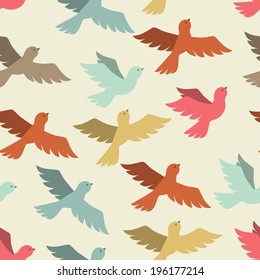 Seamless pattern with stylized color flying birds.