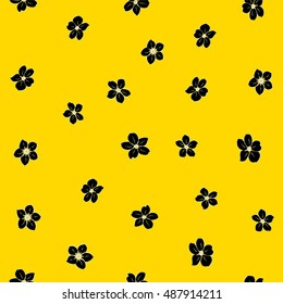 Seamless pattern of stylized floral motif, many small flowers, hole, spots in black and yellow colors. Hand drawn small flowers. Vector seamless floral background in black and yellow colors.