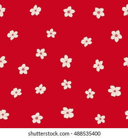 Seamless pattern of stylized floral motif, many small flowers, hole, spots in red and white colors. Hand drawn small flowers. Vector seamless floral background in red and white colors.