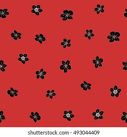 Seamless pattern of stylized floral motif, many small flowers, hole, spots in black and red colors. Hand drawn small flowers. Vector seamless floral background in black and red colors.