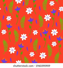 Seamless pattern. Stylized flowers and leaves on a orange background. Doodle.