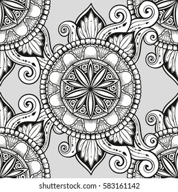 Seamless pattern with stylized flowers. Zentangle inspired. Floral black and white background can be used for wallpaper, pattern fills, web page, kids textile, clothes, yoga carpet. Indian motifs.