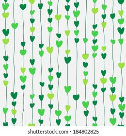 Seamless pattern of stylized green hearts on threads