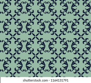 Seamless pattern with stylized lilies (Fleur De Lis)
