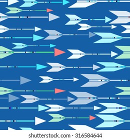 Seamless pattern with stylized multicolored arrows. Blue background.