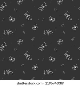 seamless pattern of stylized white butterflies on a black background