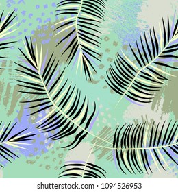 Seamless pattern with summer tropical leaves and geometrics background in memphis style. 