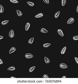 Seamless pattern with sunflower seeds. Vector  doodle black and white background.