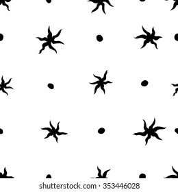Seamless pattern with the suns / stars and dots / black and white
