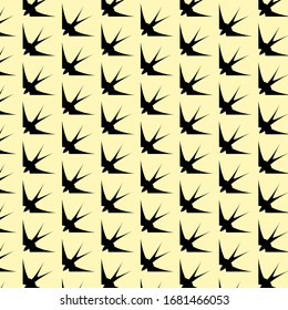 Seamless pattern of swallow silhouettes on a  light blue, light yellow, etc. background. Flying birds in different views. Vector Design element.