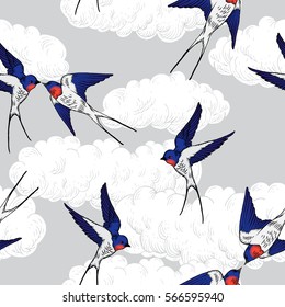 Seamless pattern with the swallows flying in the sky. Tattoo style, cloud engraving, vintage. Hand drawn illustration.