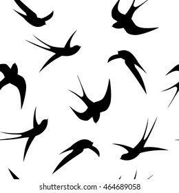 Seamless pattern. Swallows on a white background.
