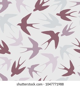 Seamless pattern with swallows in pastel colors. For decorating textiles, packaging and wallpaper. Vector illustration.