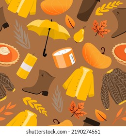 Seamless pattern sweater, falling leaves, candles, book, umbrella. Collection of fall season elements. isolated on white background. Autumn cozy concept.