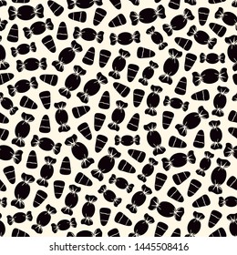 Seamless pattern with sweets. Halloween holiday background. Trick or treat wallpaper. Repeated candy silhouettes print. Kids scrapbook digital paper, textile print, page fill. Vector illustration